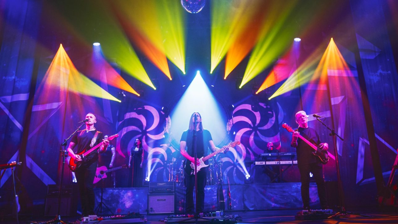 Band performing with light show